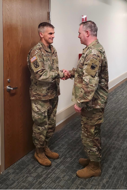 Colonel Benjamin Lindsey, Deputy Commander of the USAR – Consequence Management Unit, promotes Joseph Sadighi from Major to Lieutenant Colonel, August 2023.