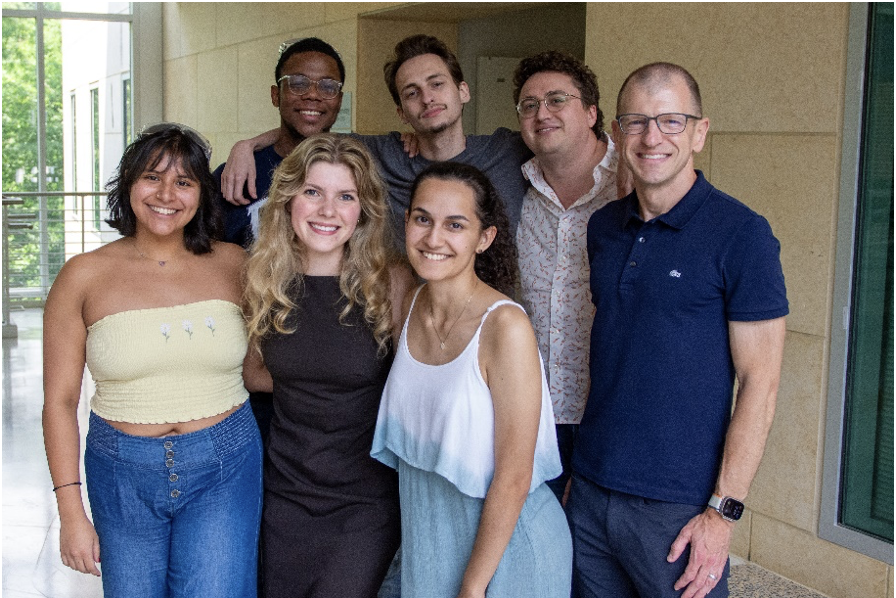 Ms Lauren Hash (BS CHEM), center middle, with her lab mates from the Soper group.