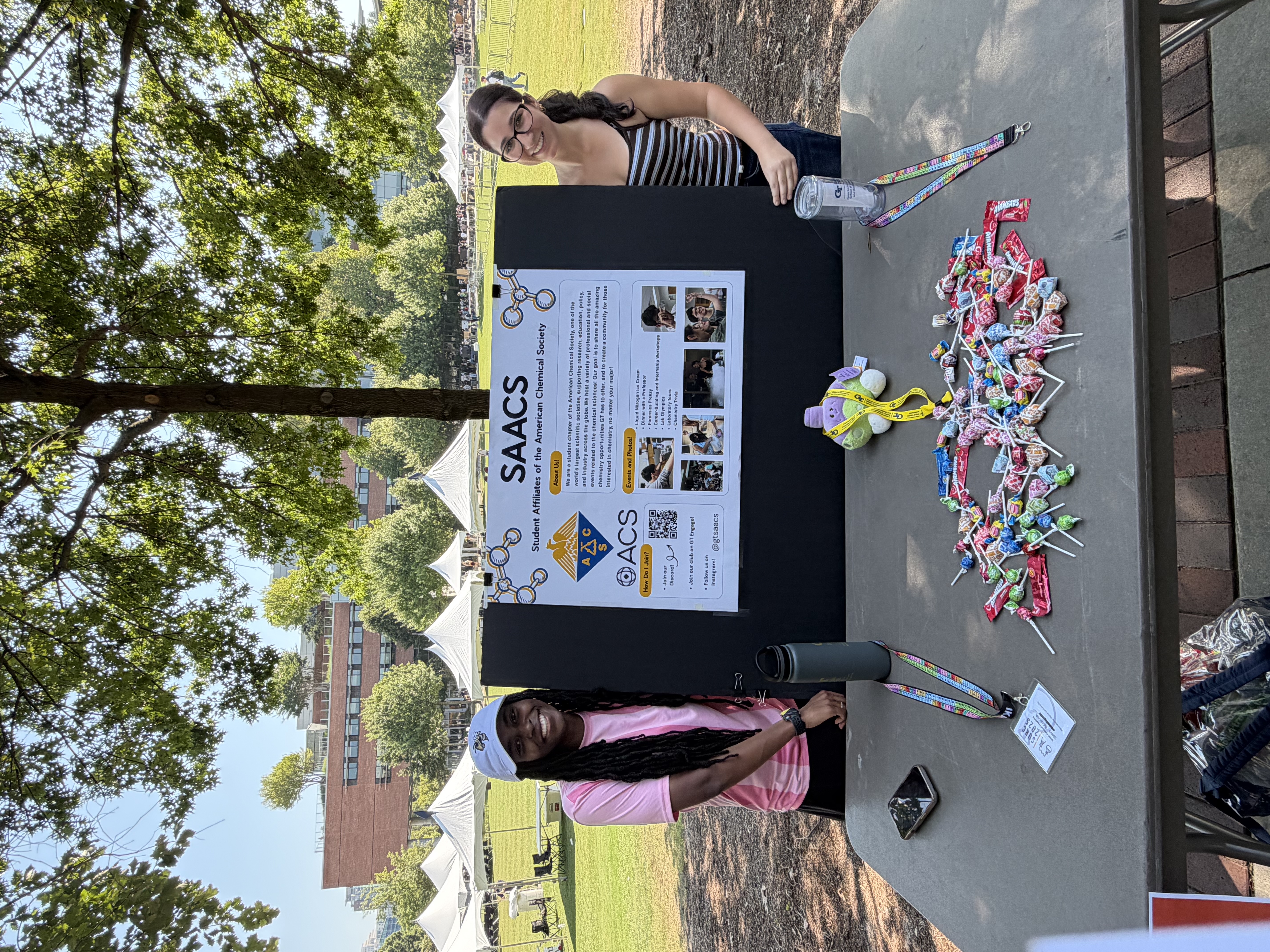 SAACS officers recruit at a table on Tech Green.
