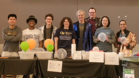 Loren Williams and members of the Williams lab pose following their Atlanta Science Festival event.