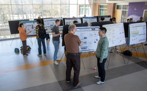 Presenters and attendees at the 2026 spring research showcase.