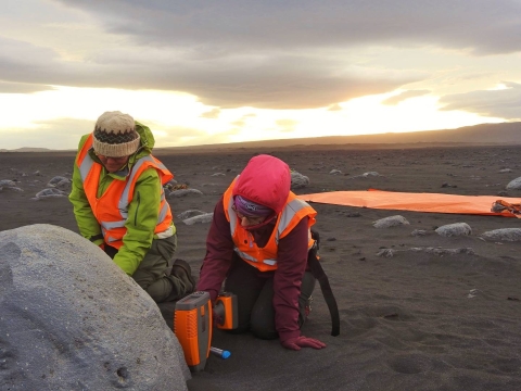 Students using handheld portable chemical analysis instrumentation analogous to those used on Mars.